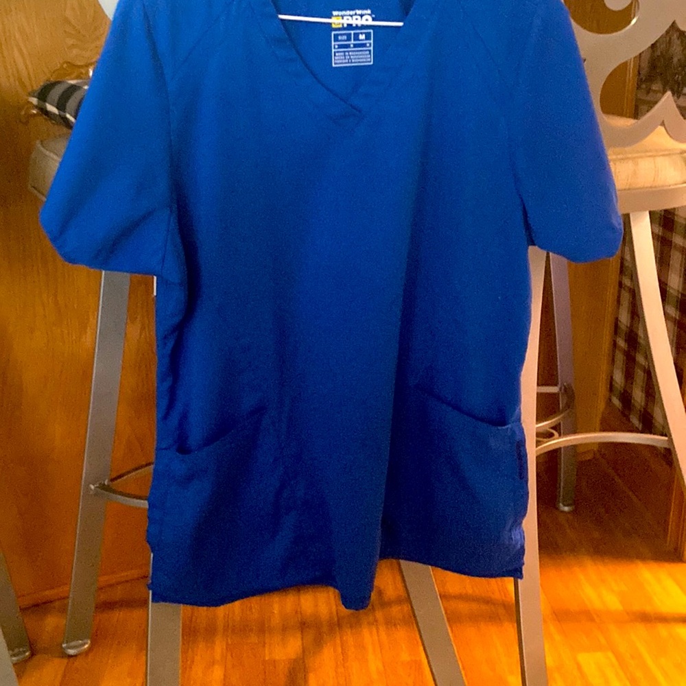 Black and blue scrub pants and 1 top.